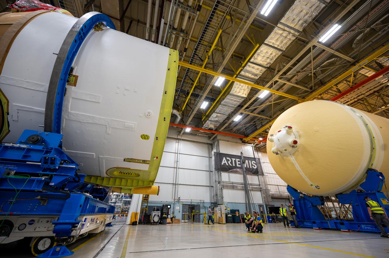 Technicians at NASA’s Michoud Assembly Facility in New Orleans moved the engine section of NASA’s Space Launch System (SLS) rocket for Artemis II, the first crewed mission to the Moon, into position for the final join of the core stage Feb. 22. The engine section is the bottom-most portion of the 212-foot-tall core stage. It is the last of five major elements that is needed to connect the stage into one major structure. In addition to its miles of cabling and hundreds of sensors, the engine section is a crucial attachment point for the four RS-25 engines and two solid rocket boosters that produce a combined 8.8 million pounds of thrust at liftoff and flight. During launch and flight, liquid propellants from the liquid hydrogen tank and liquid oxygen tanks are delivered through the engine section to the four RS-25 engines. The engine section also includes the avionics that help steer the engines after liftoff. Next, teams will join the engine section to the core stage for the second SLS rocket. After the join is complete, teams will begin to add each of the four RS-25 engines one by one to complete the stage. The completely assembled stage with its four RS-25 engines will be shipped to NASA’s Kennedy Space Center in Florida later this year. The SLS rocket is the only rocket capable of carrying astronauts in Orion around the Moon in a single mission.